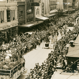 Crowds and floats during the John Martin's Christmas pageant